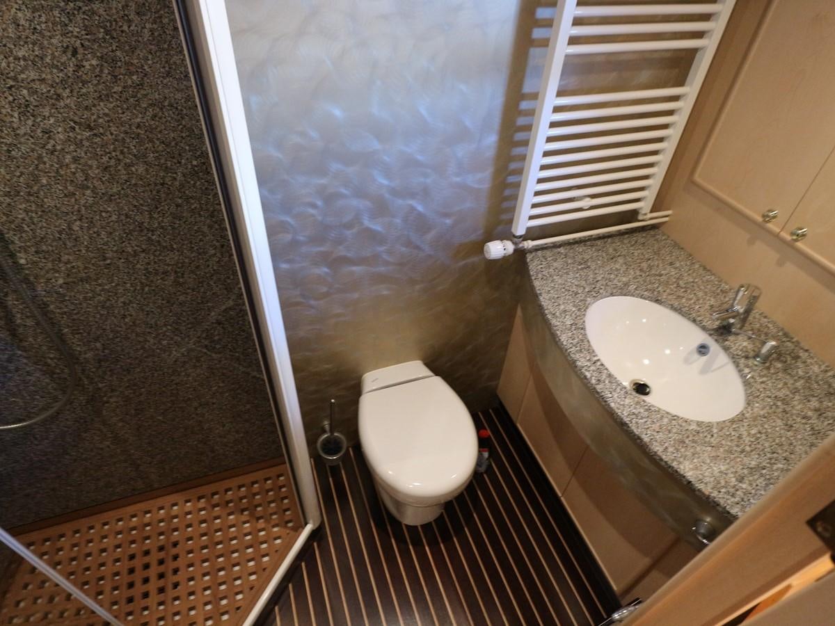 a bathroom with a sink and a toilet aboard Polar Princess Yacht for Sale