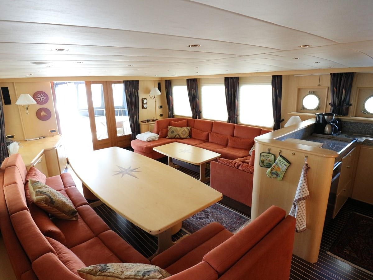 a living room with a kitchen and living room aboard Polar Princess Yacht for Sale