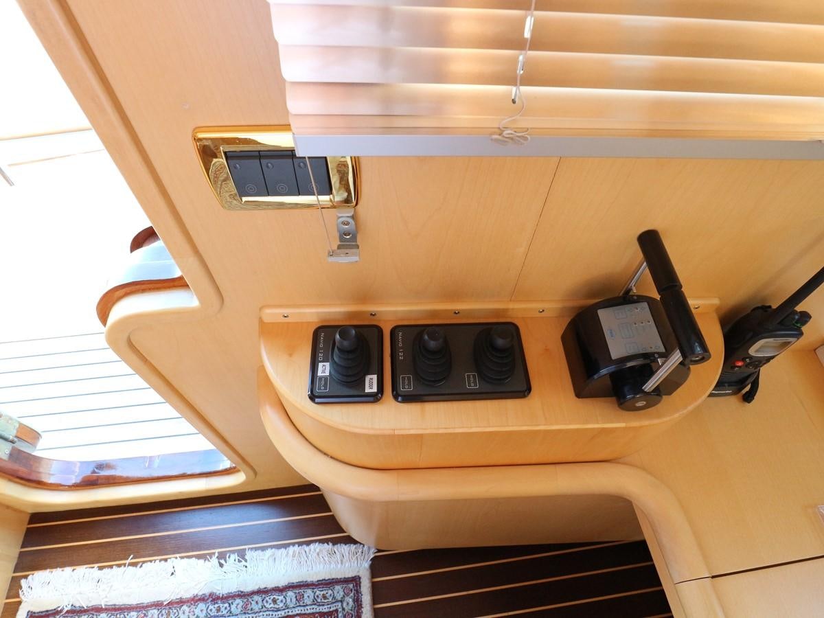 a radio on a table aboard Polar Princess Yacht for Sale
