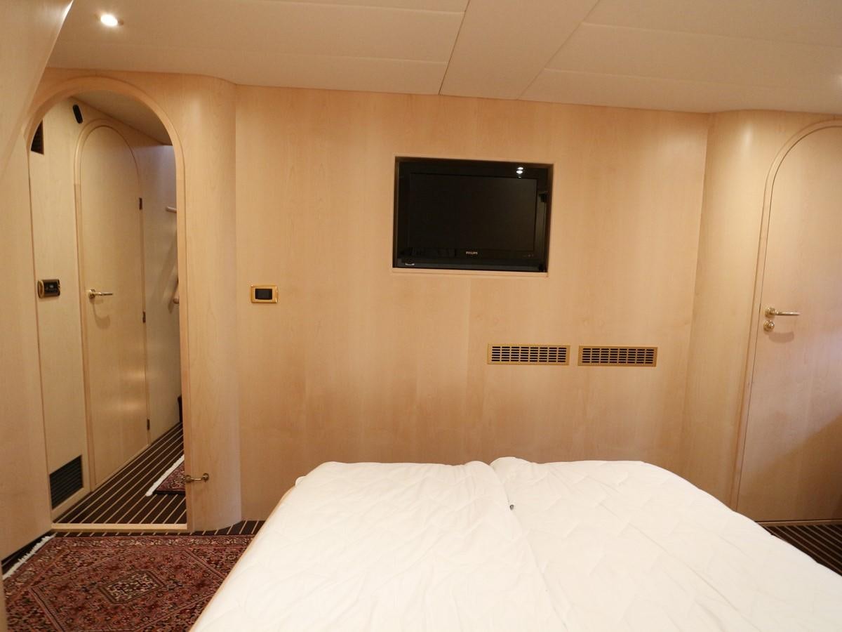 a tv on a wall aboard Polar Princess Yacht for Sale