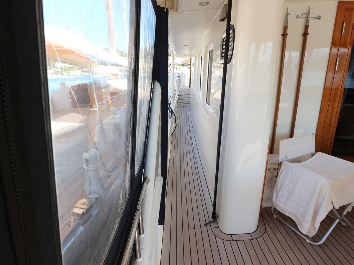 a room with a glass door aboard Polar Princess Yacht for Sale