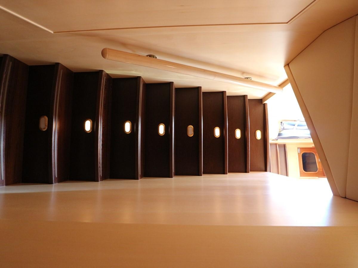 a room with a large black cabinet aboard Polar Princess Yacht for Sale