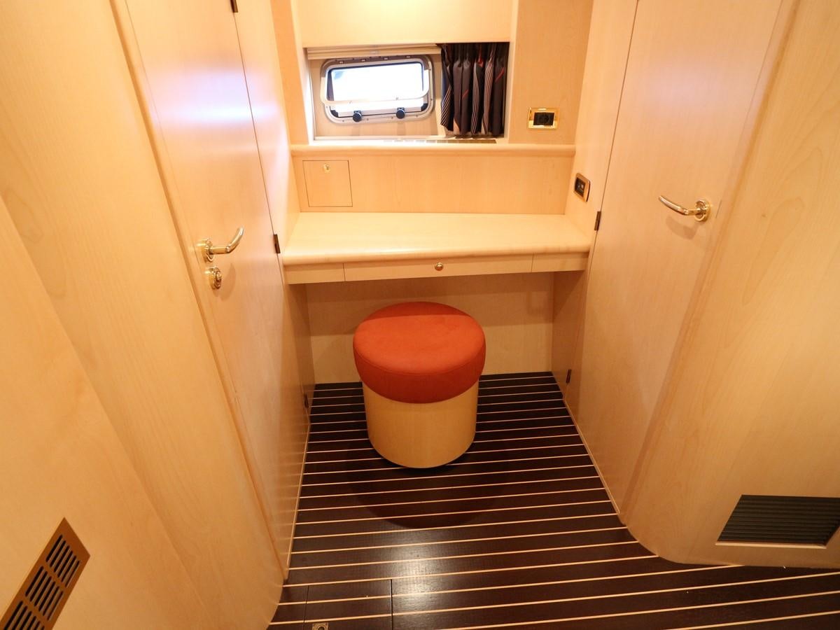 a small bathroom with a black floor aboard Polar Princess Yacht for Sale