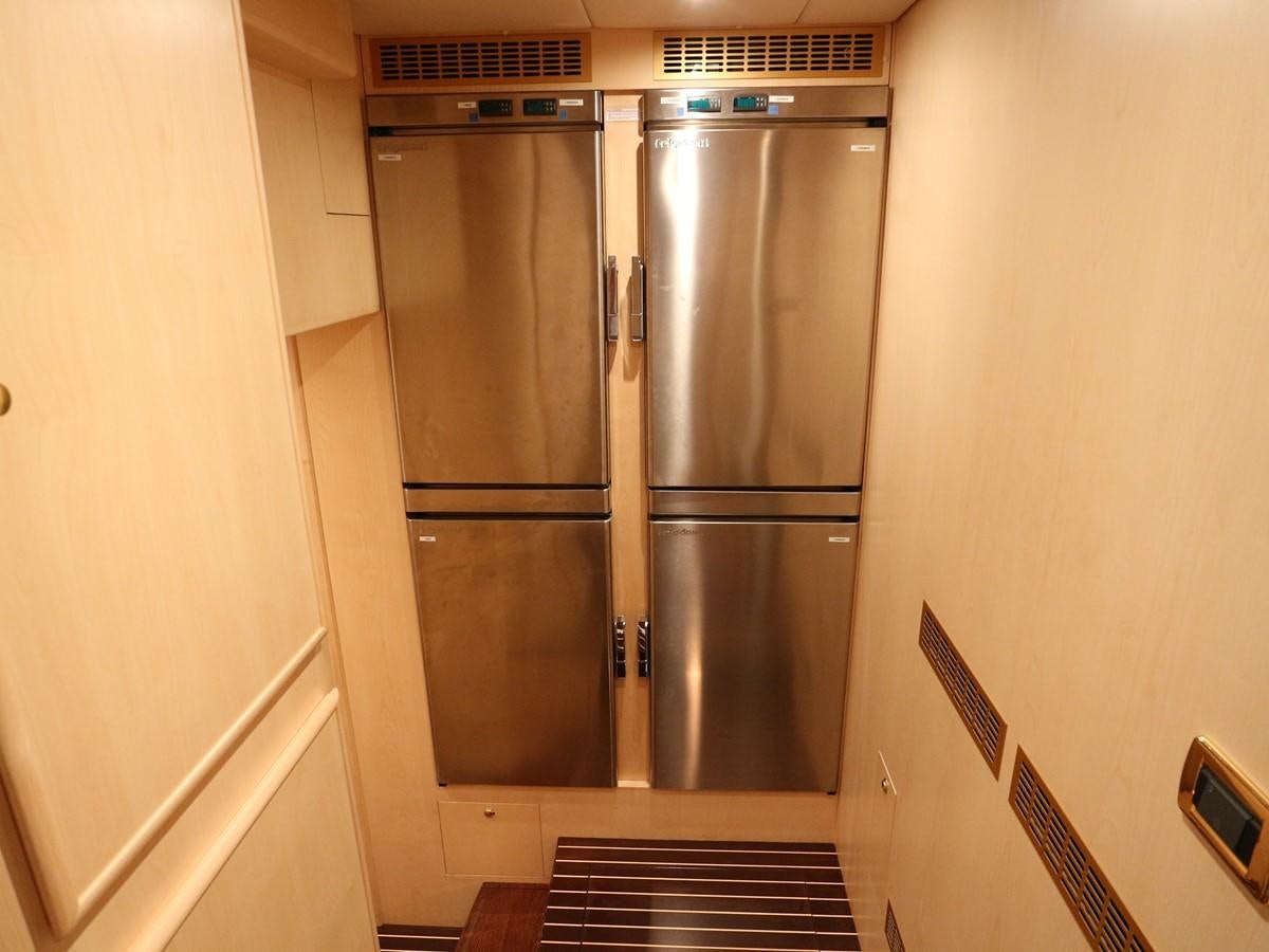 a refrigerator in a kitchen aboard Polar Princess Yacht for Sale