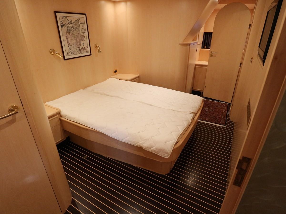 a bed in a room aboard Polar Princess Yacht for Sale