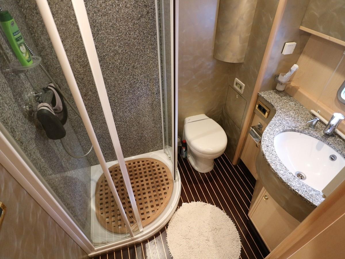 a bathroom with a tub sink and toilet aboard Polar Princess Yacht for Sale