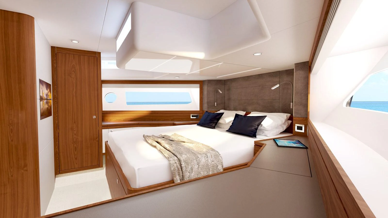 a room with a bed and a desk aboard JOHNSON 70' SKYLOUNGE M/Y Yacht for Sale
