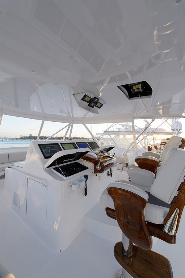 a group of chairs in a room aboard NOTORIOUS Yacht for Sale
