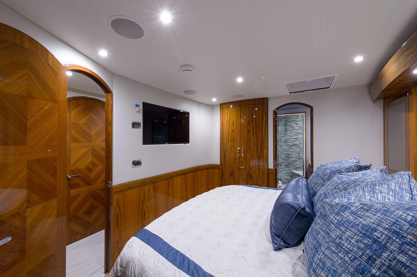 a bed in a room aboard NOTORIOUS Yacht for Sale