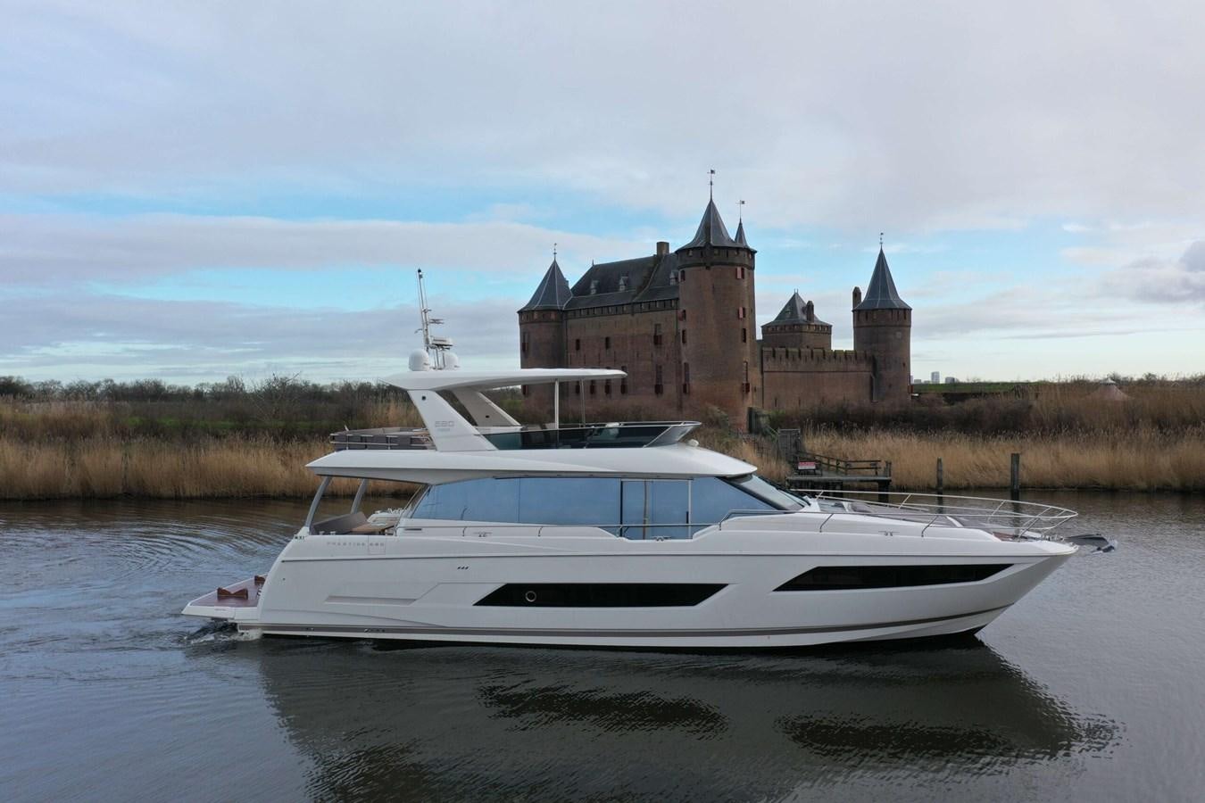 a boat on the water aboard PRESTIGE 680 FLY Yacht for Sale