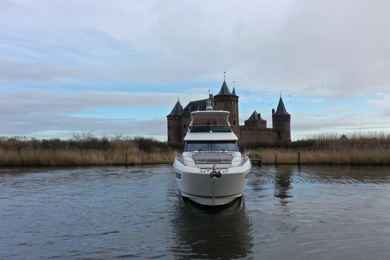 a boat on the water aboard PRESTIGE 680 FLY Yacht for Sale