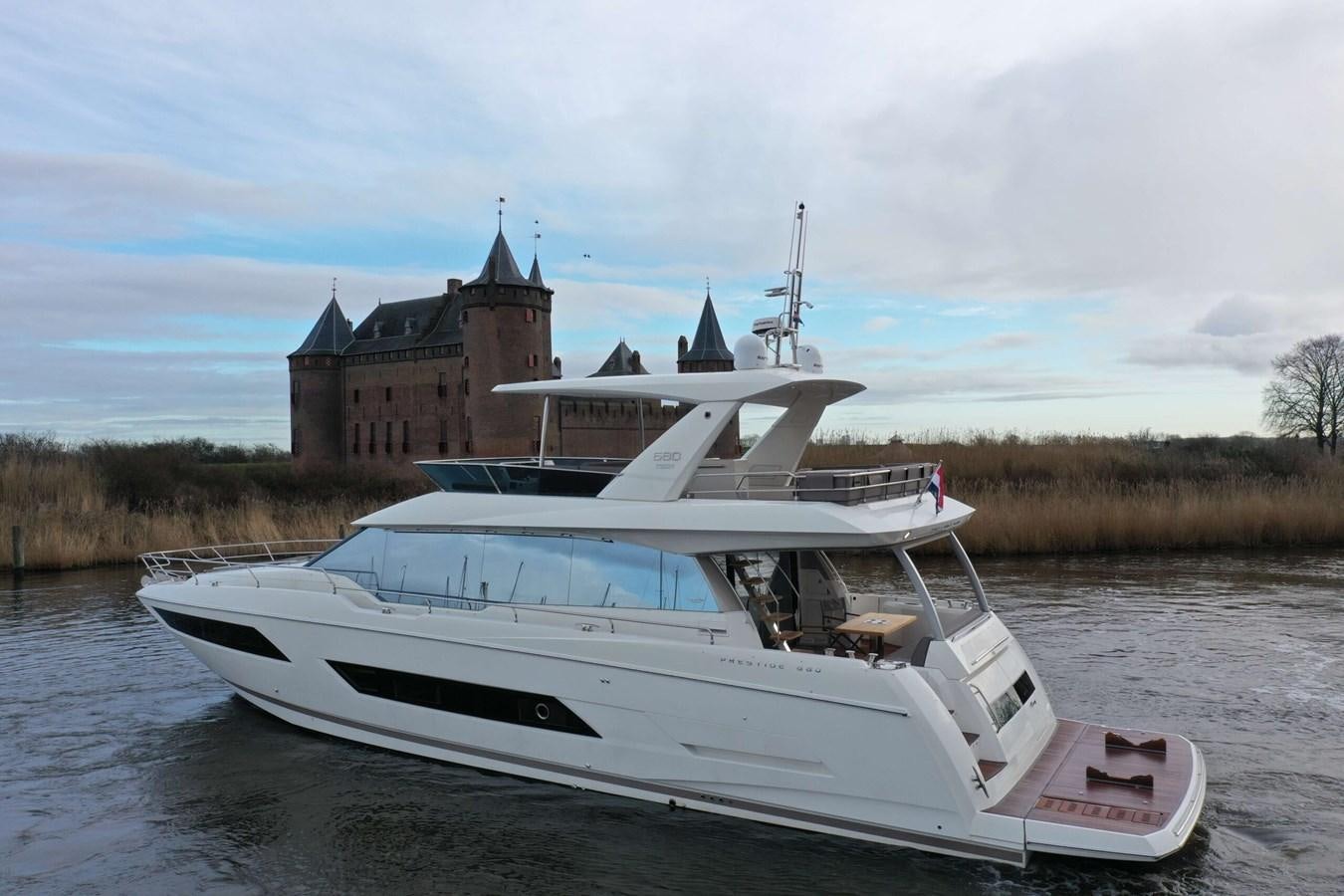 a boat on the water aboard PRESTIGE 680 FLY Yacht for Sale