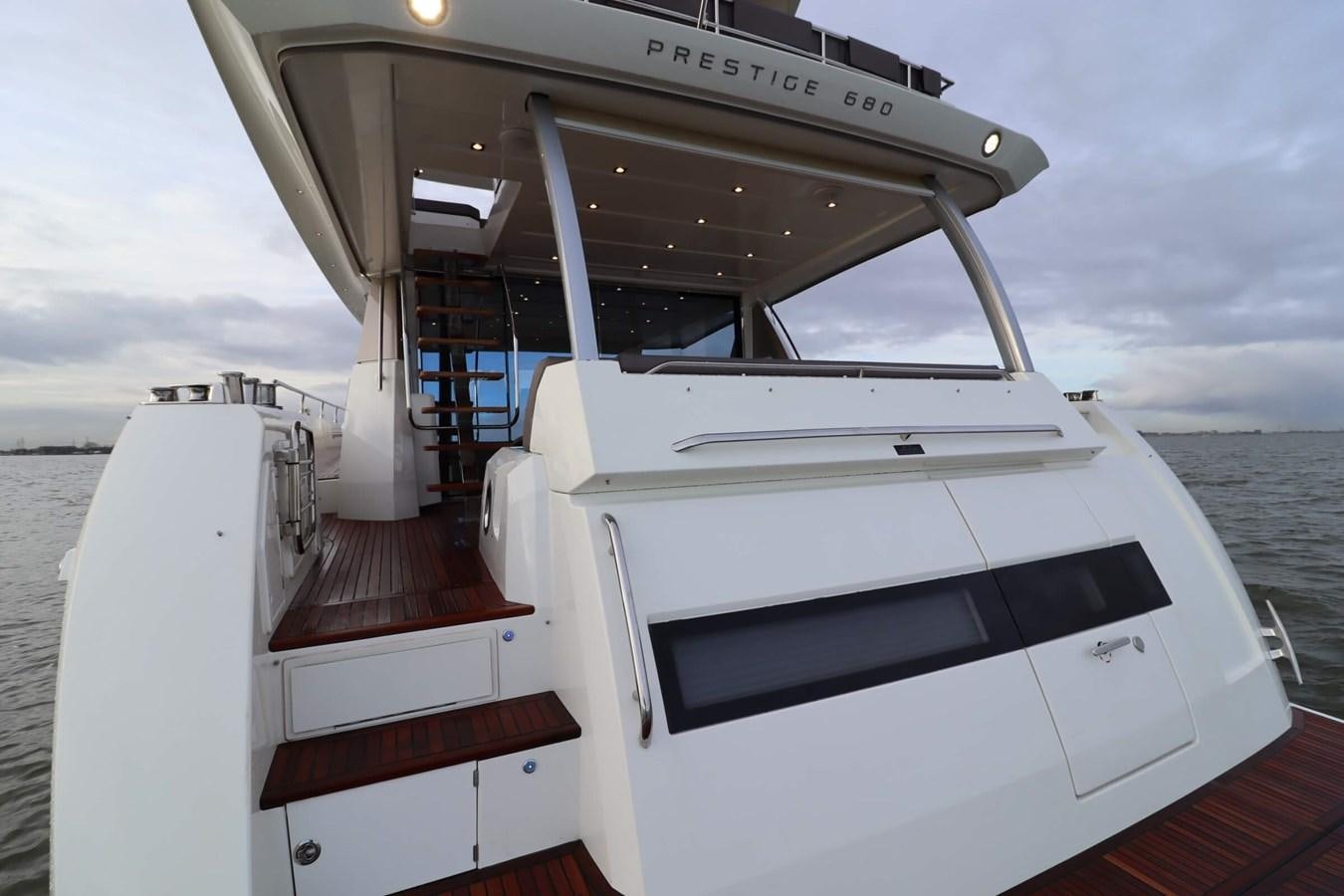 a boat on the water aboard PRESTIGE 680 FLY Yacht for Sale