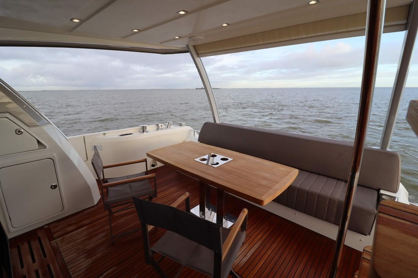a boat on the water aboard PRESTIGE 680 FLY Yacht for Sale