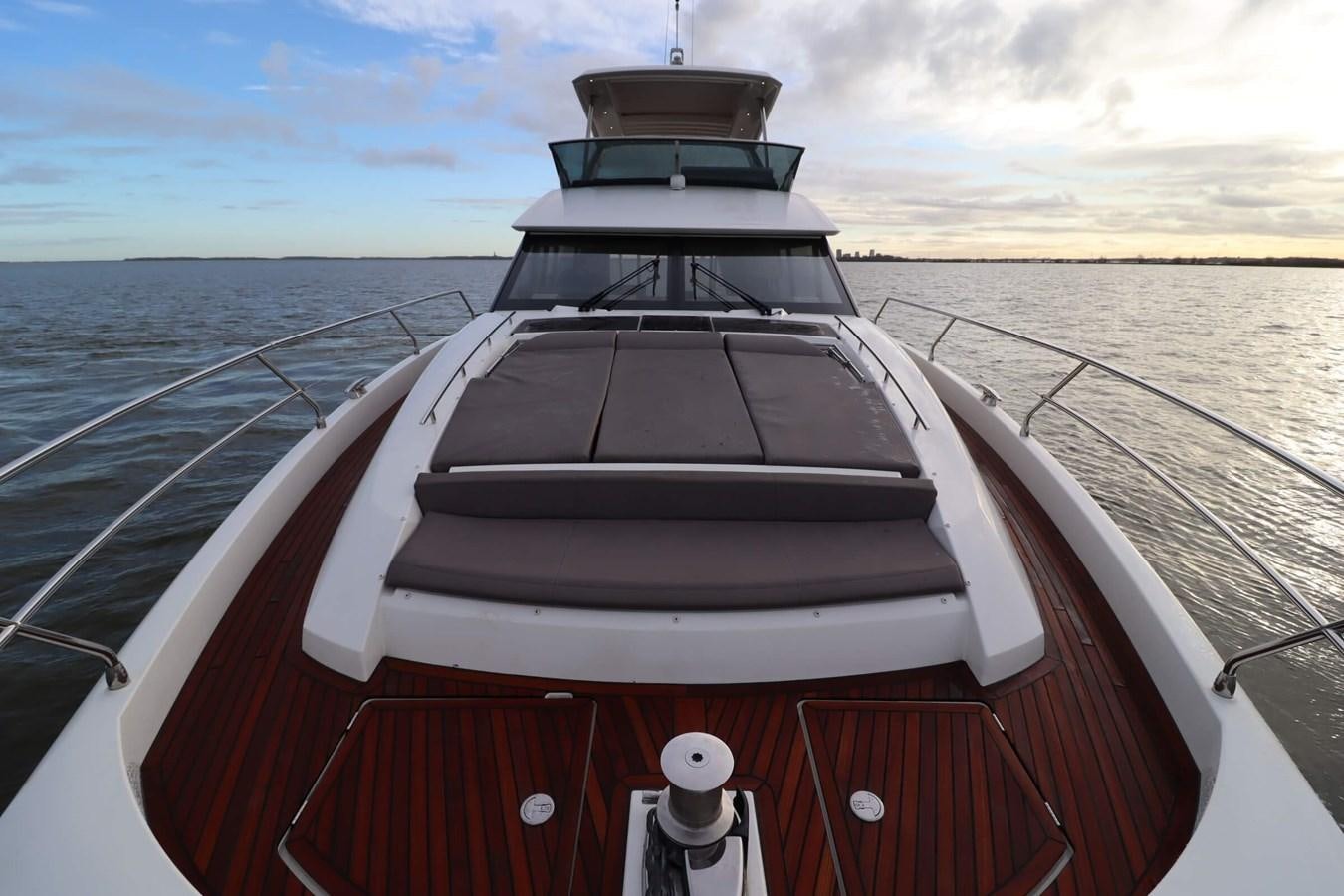 a boat on the water aboard PRESTIGE 680 FLY Yacht for Sale