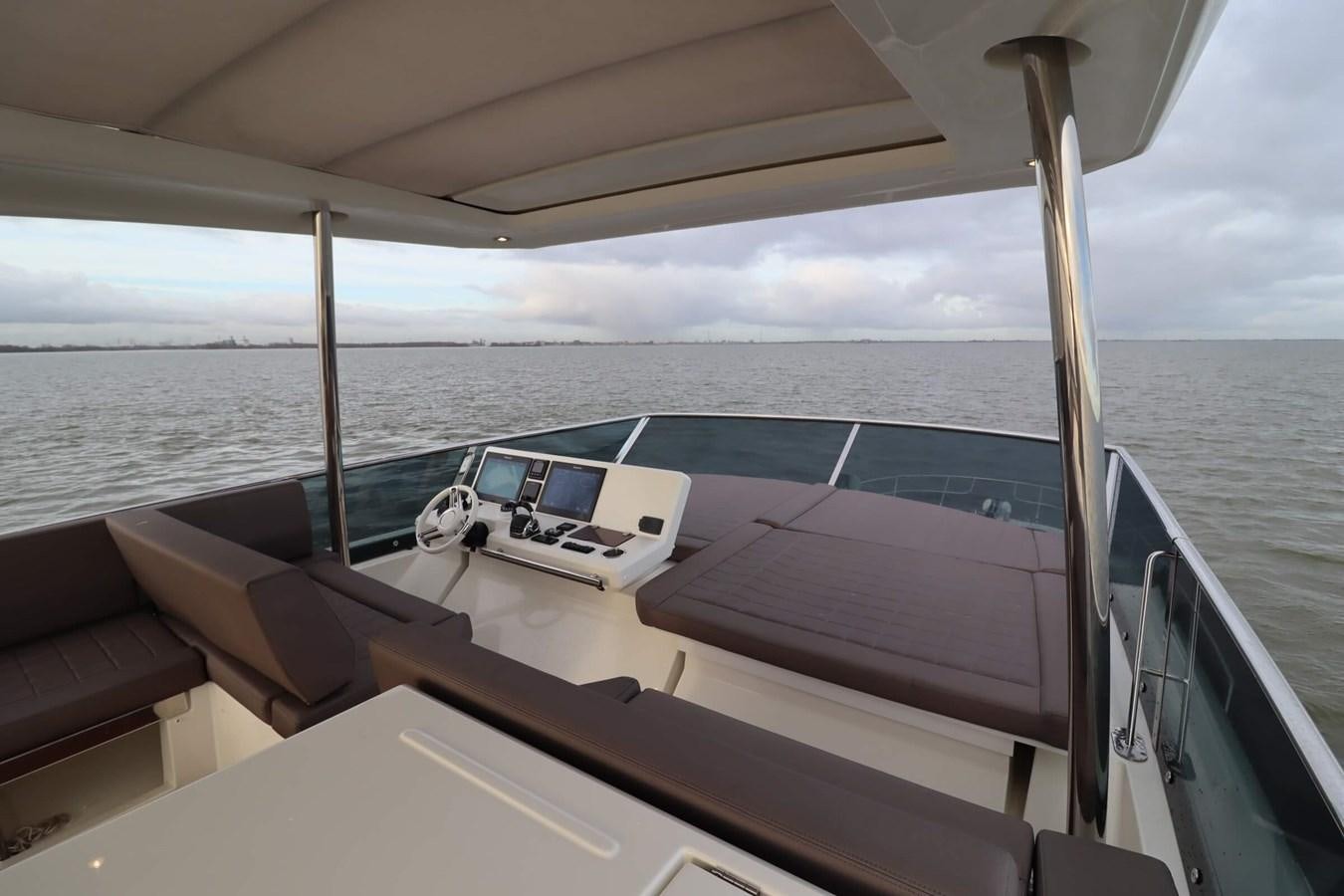 a boat on the water aboard PRESTIGE 680 FLY Yacht for Sale