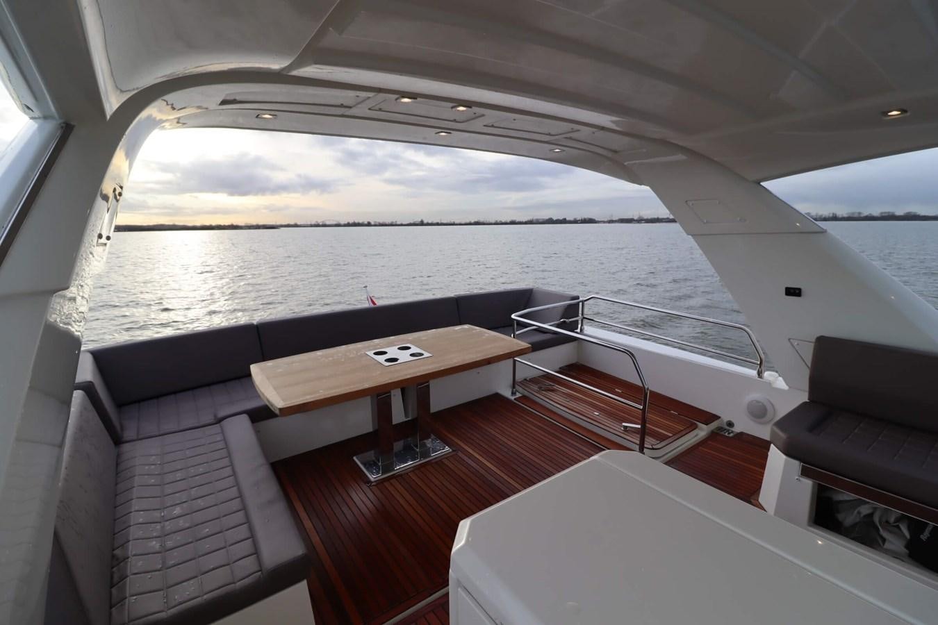 a boat on the water aboard PRESTIGE 680 FLY Yacht for Sale
