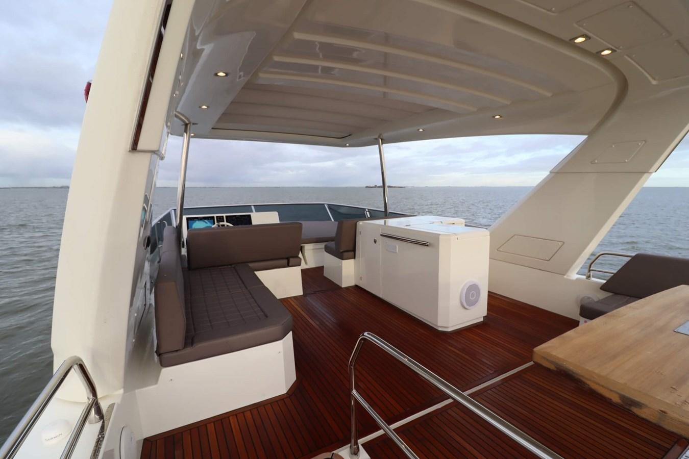 a boat on the water aboard PRESTIGE 680 FLY Yacht for Sale