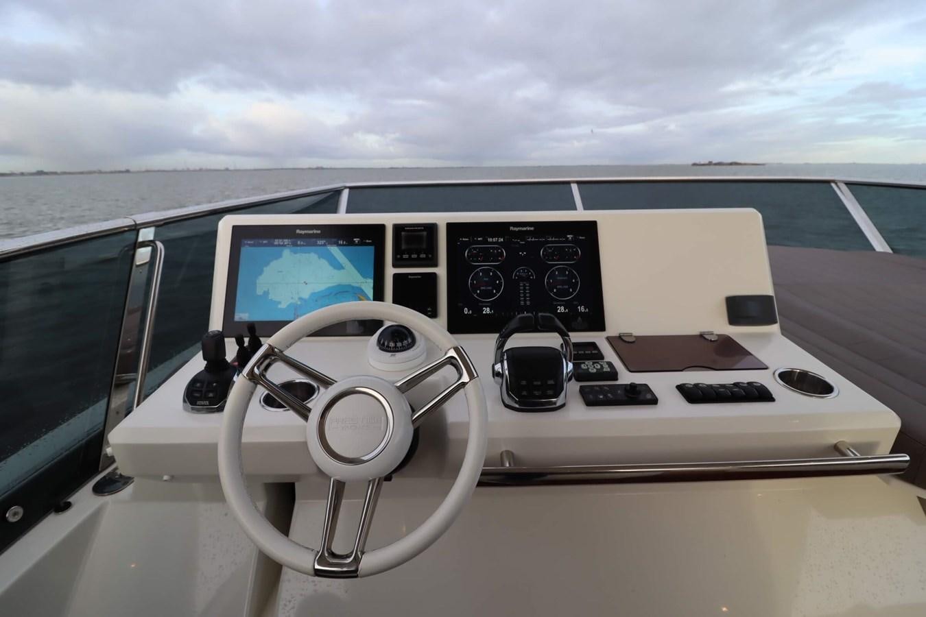 a control panel on a boat aboard PRESTIGE 680 FLY Yacht for Sale