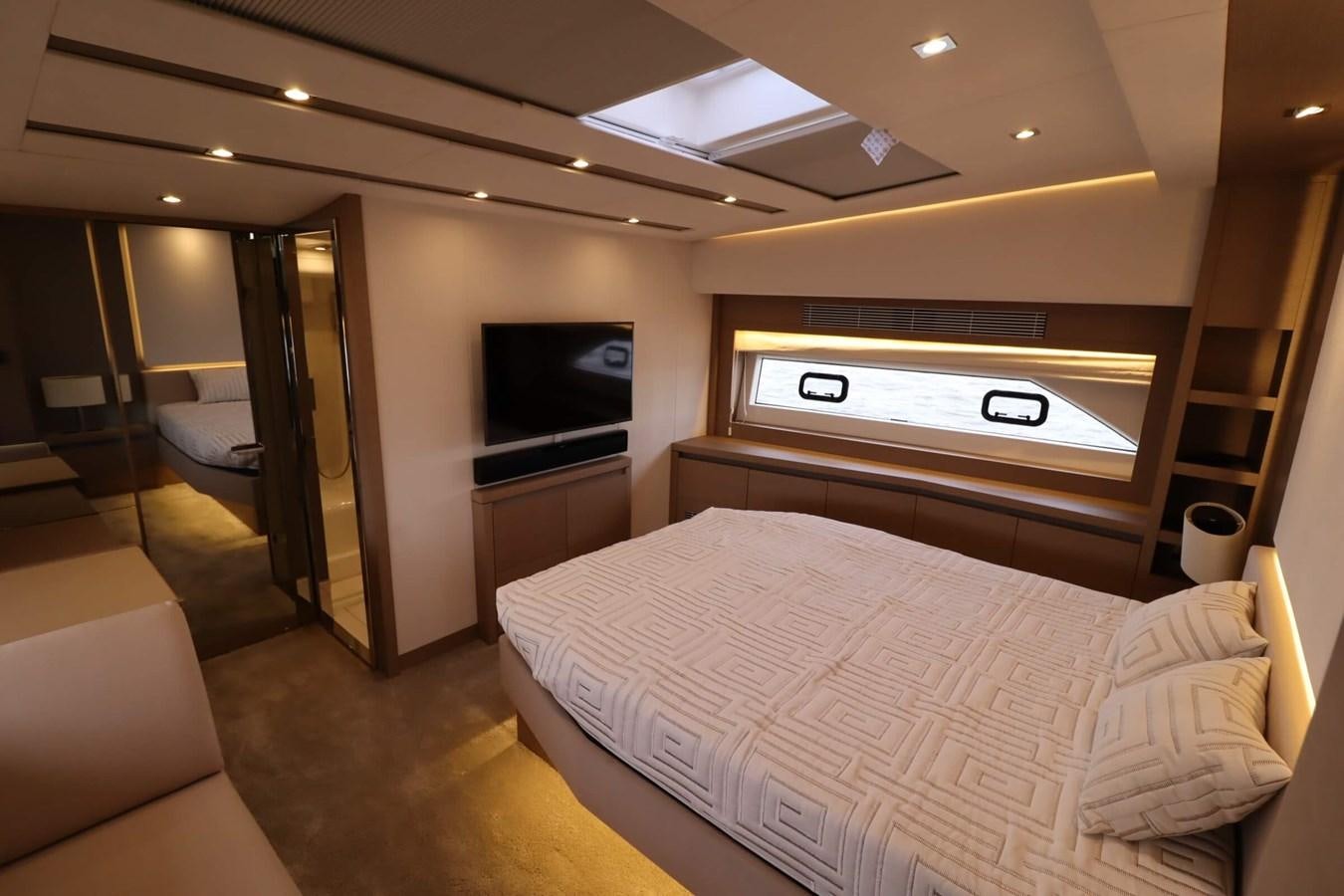 a hotel room with a bed aboard PRESTIGE 680 FLY Yacht for Sale