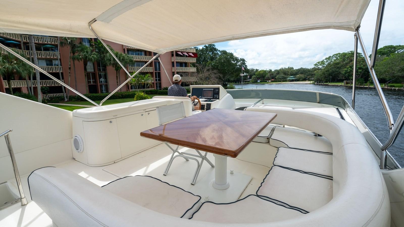 a boat on the water aboard FOOLISH PLEASURE Yacht for Sale