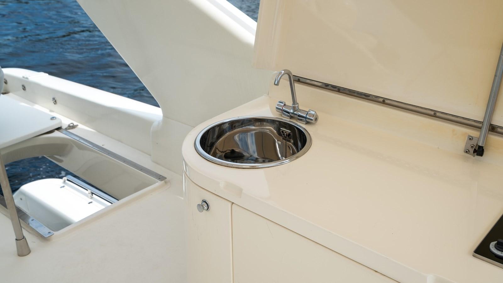 a sink in a bathroom aboard FOOLISH PLEASURE Yacht for Sale