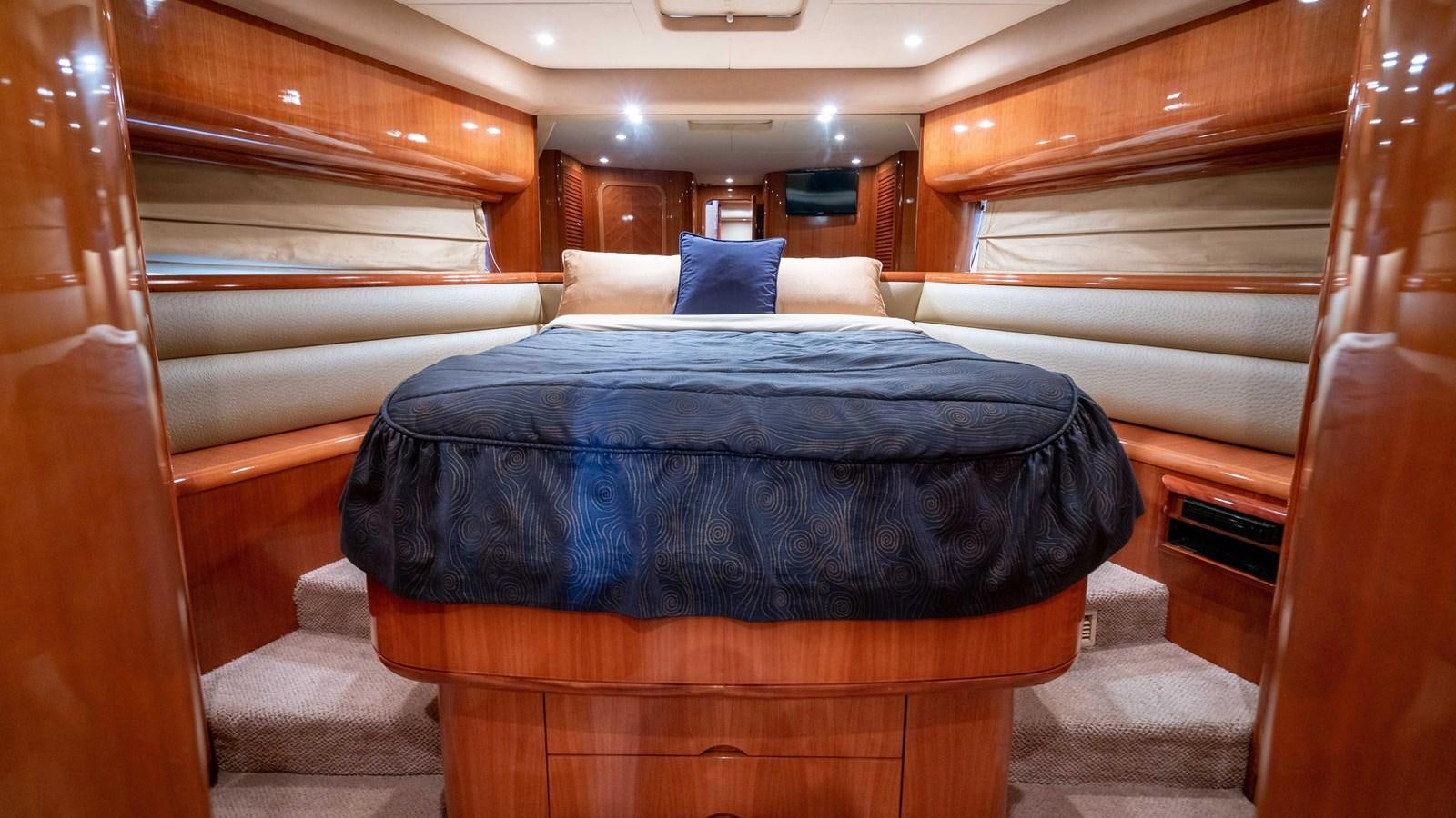 a bed in a cabin aboard FOOLISH PLEASURE Yacht for Sale