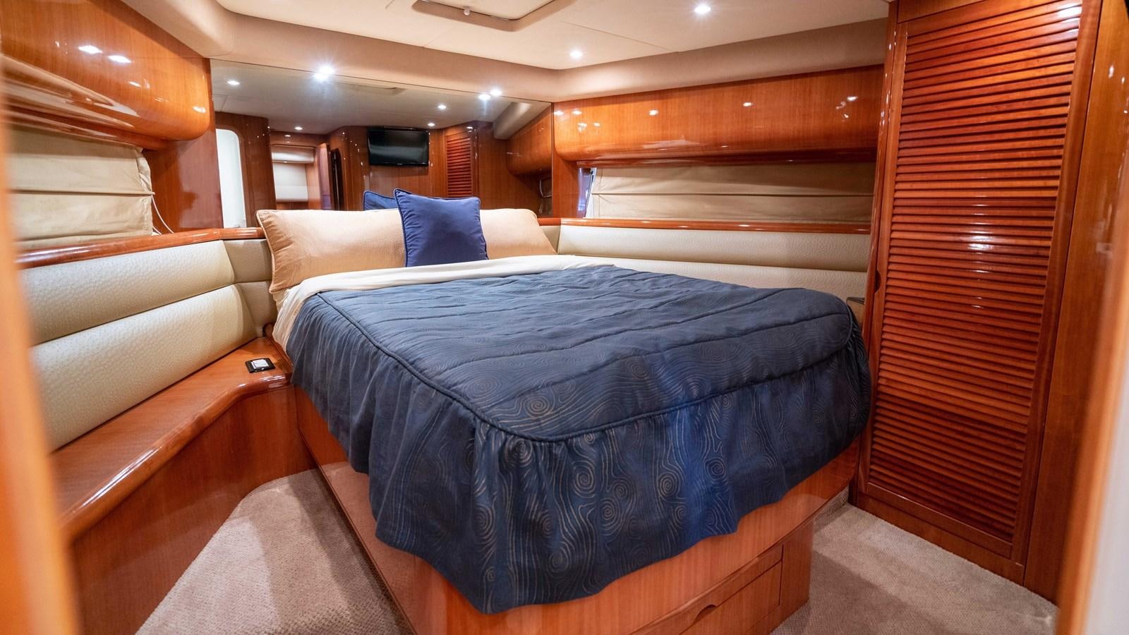 a bed in a cabin aboard FOOLISH PLEASURE Yacht for Sale