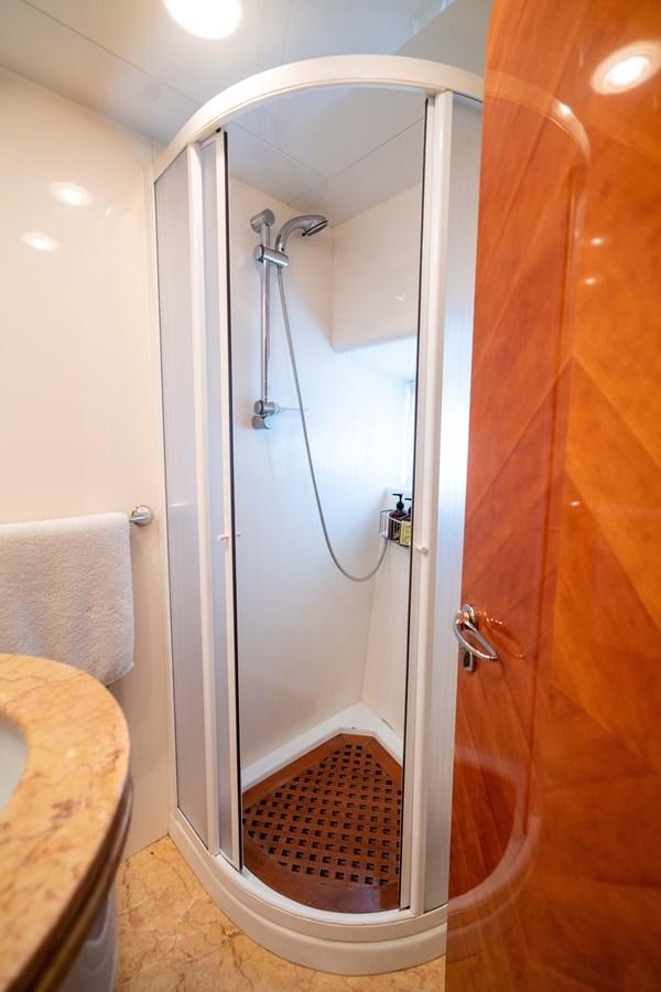 a shower with a glass door aboard FOOLISH PLEASURE Yacht for Sale