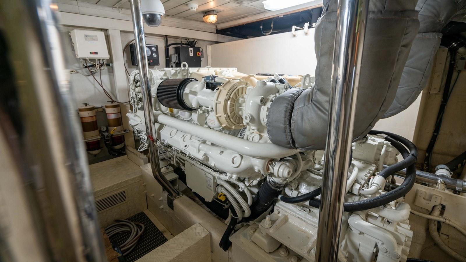 a machine with a large metal pipe aboard FOOLISH PLEASURE Yacht for Sale