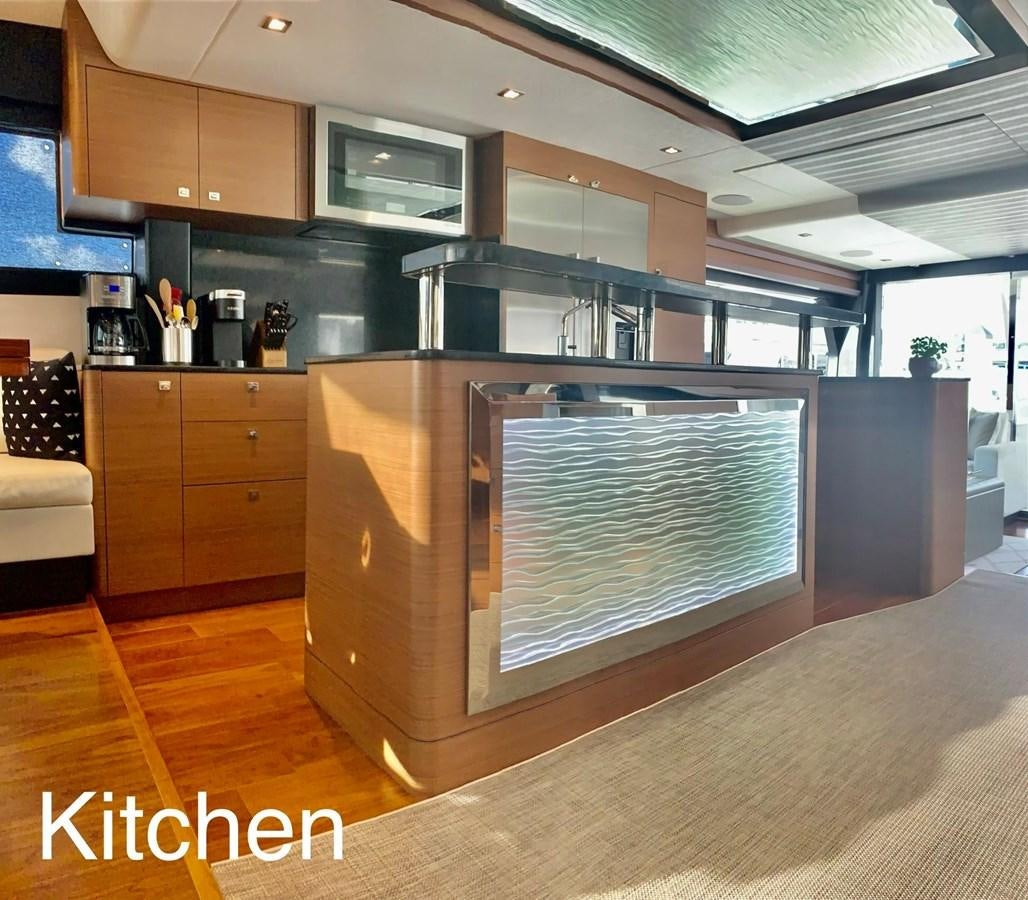 a kitchen with a large oven aboard PLAYBOOK Yacht for Sale