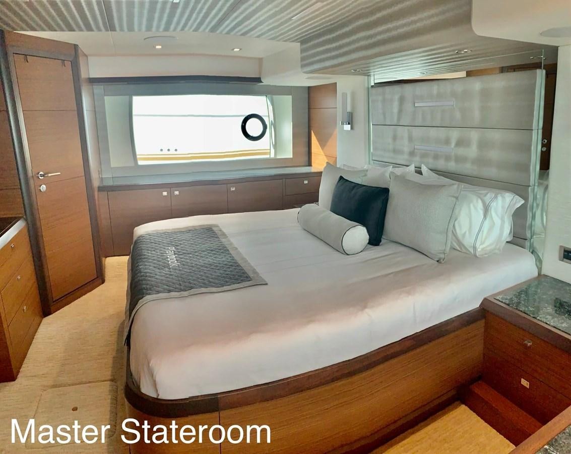 a bed in a room aboard PLAYBOOK Yacht for Sale