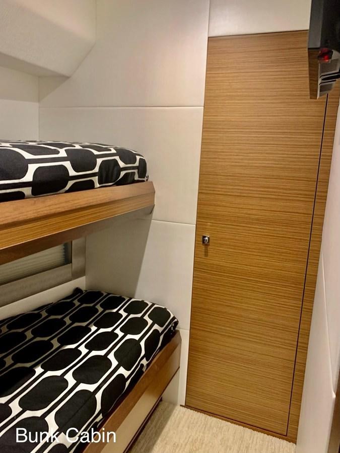 a closet with a tile floor aboard PLAYBOOK Yacht for Sale