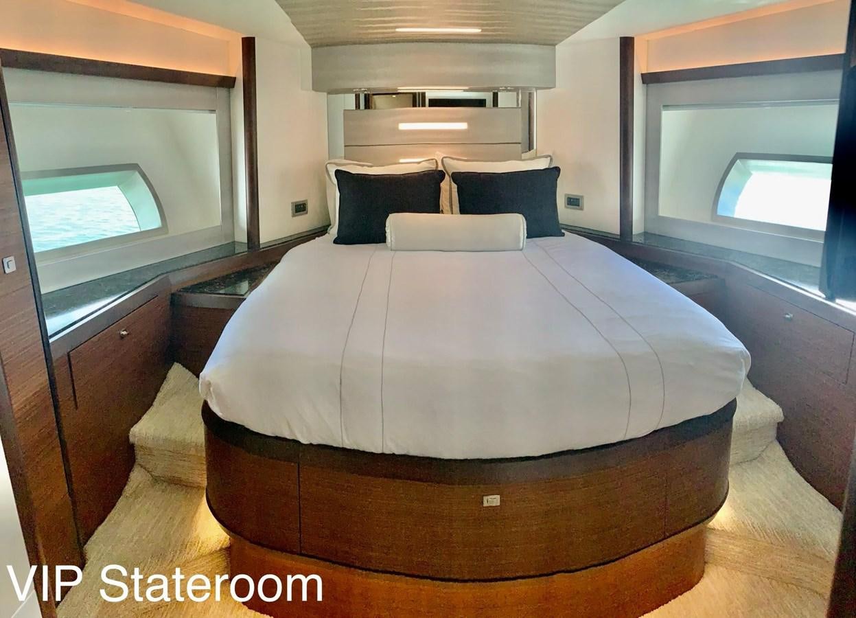 a bed in a room aboard PLAYBOOK Yacht for Sale