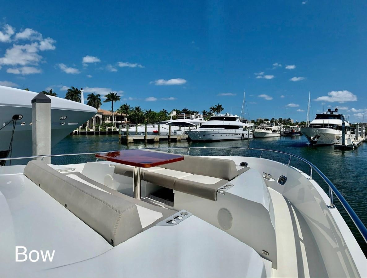 a boat is parked at a dock aboard PLAYBOOK Yacht for Sale