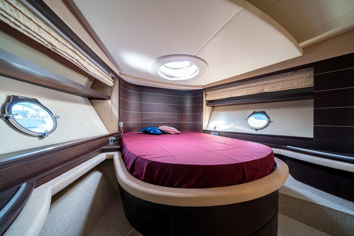 a bed in a room aboard AROMA Yacht for Sale