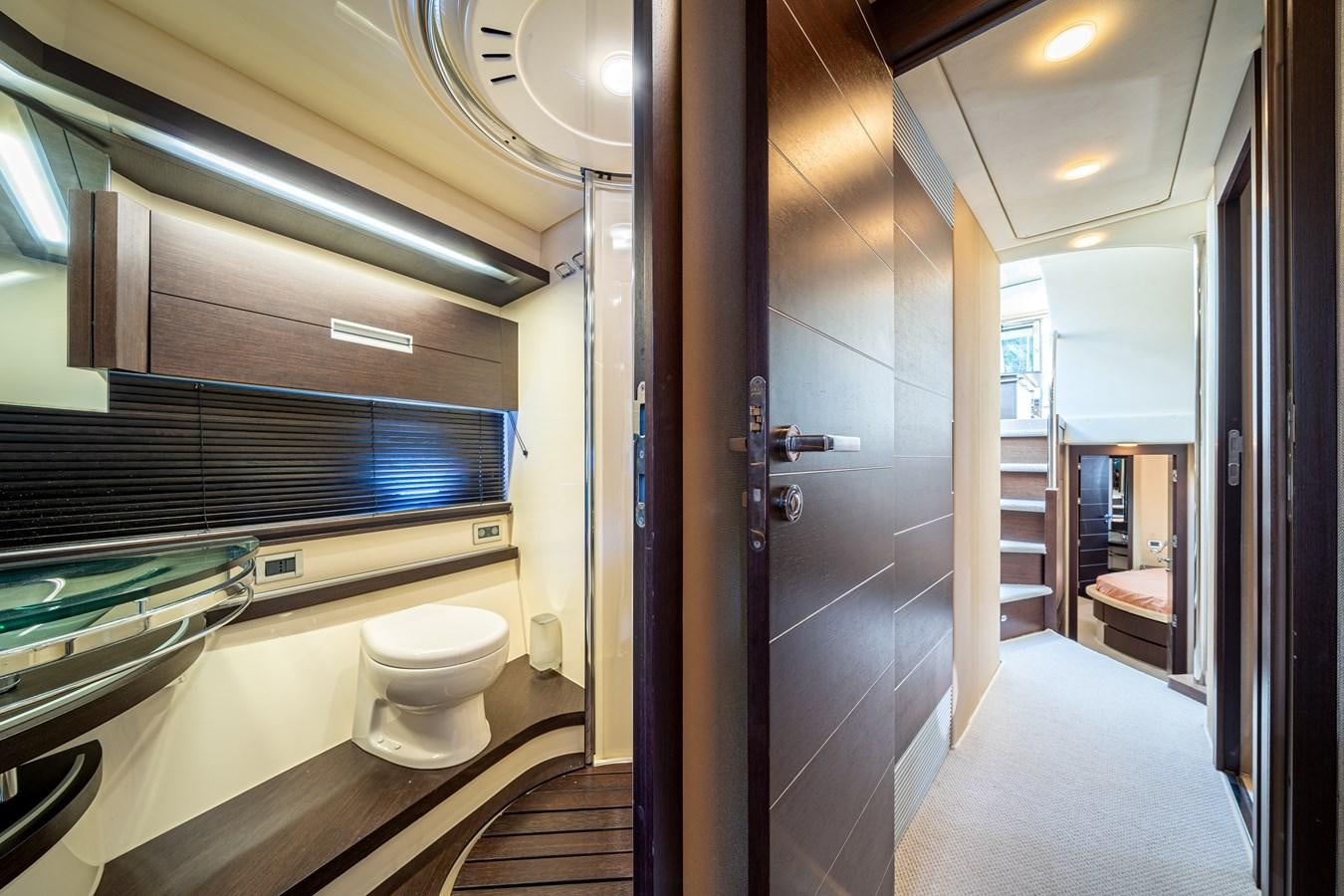 a bathroom with a glass shower aboard AROMA Yacht for Sale