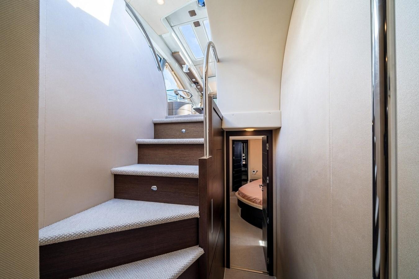 a staircase leading to a bedroom aboard AROMA Yacht for Sale
