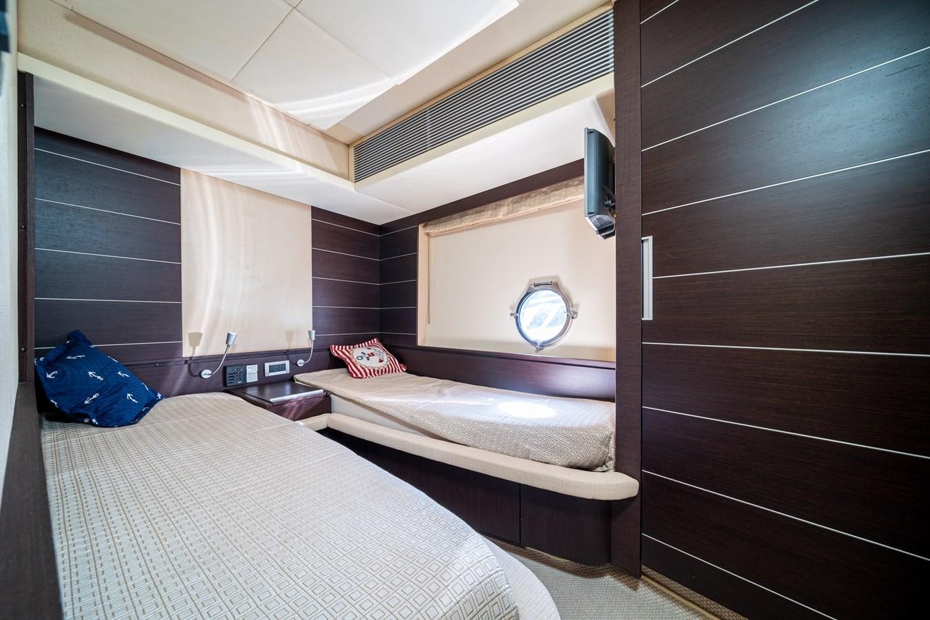 a room with two beds aboard AROMA Yacht for Sale