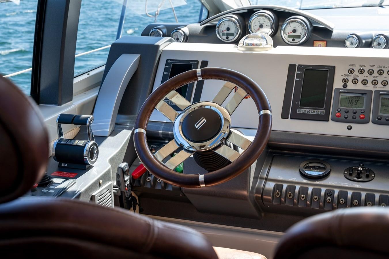 inside of a car aboard AROMA Yacht for Sale
