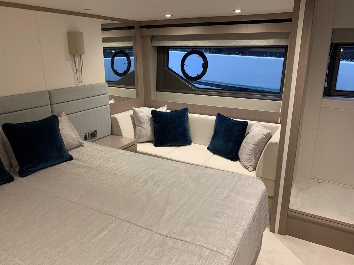 a bed with a large bed aboard AHAVA Yacht for Sale