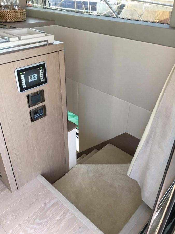 a small room with a small tv aboard AHAVA Yacht for Sale