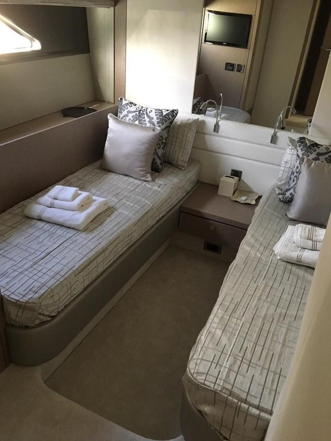 a hotel room with a bed aboard AHAVA Yacht for Sale