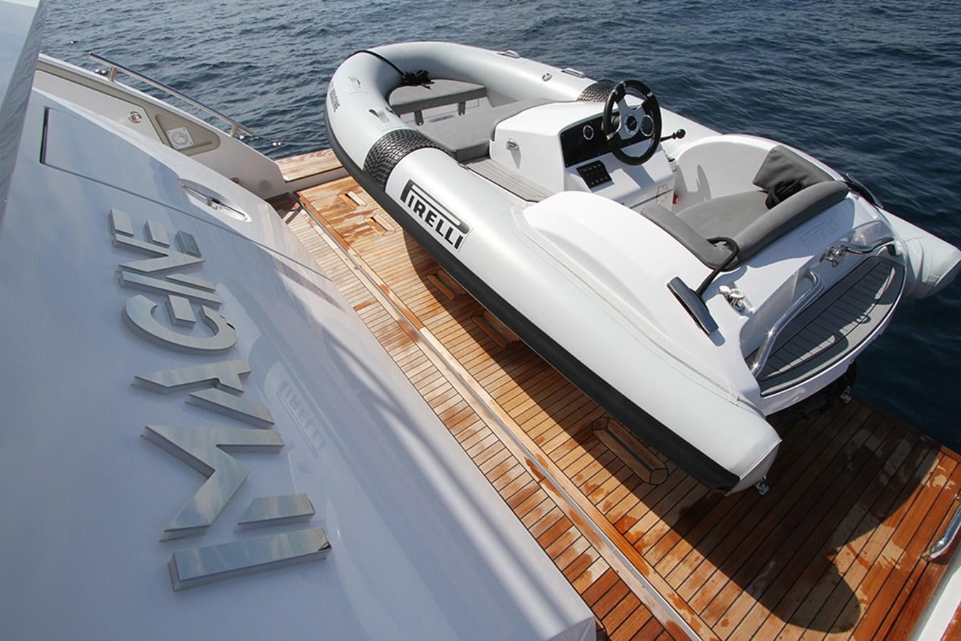 a white yacht on the water aboard IMAGINE Yacht for Sale