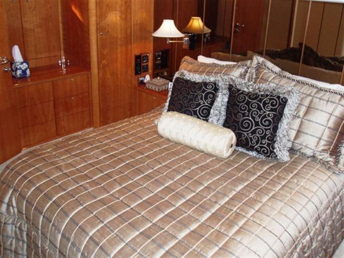 a bed with pillows aboard FOREVER SUMMER Yacht for Sale