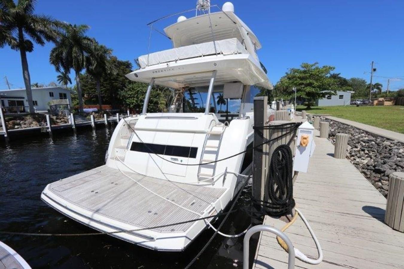 a boat on a dock aboard BREATHE EASY Yacht for Sale