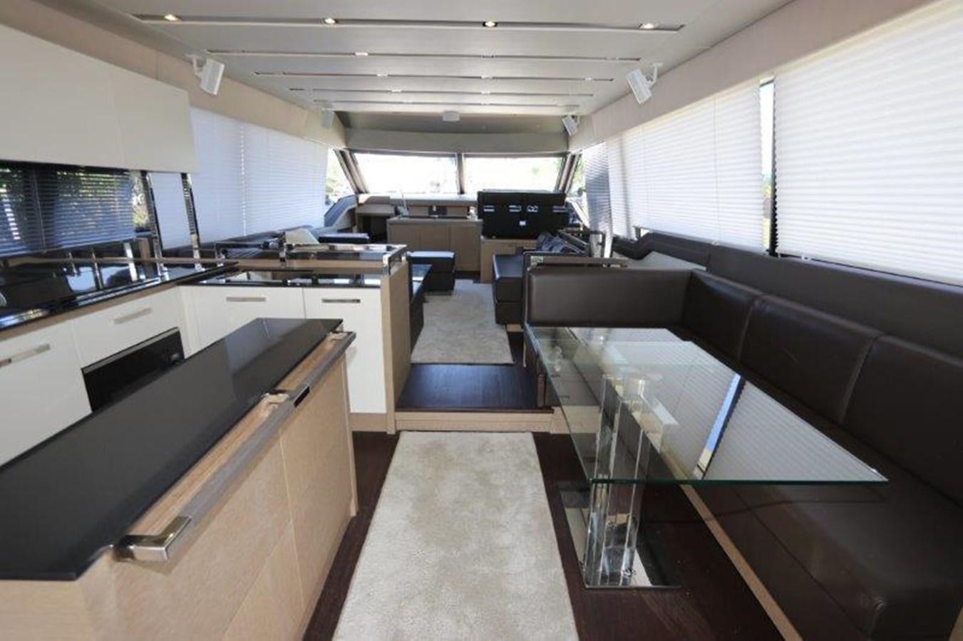 a kitchen with a large window aboard BREATHE EASY Yacht for Sale