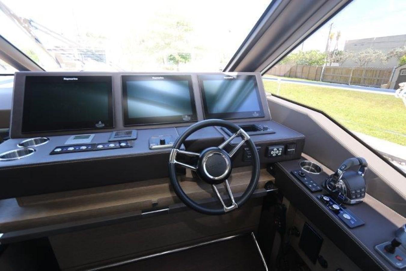 inside of a car aboard BREATHE EASY Yacht for Sale