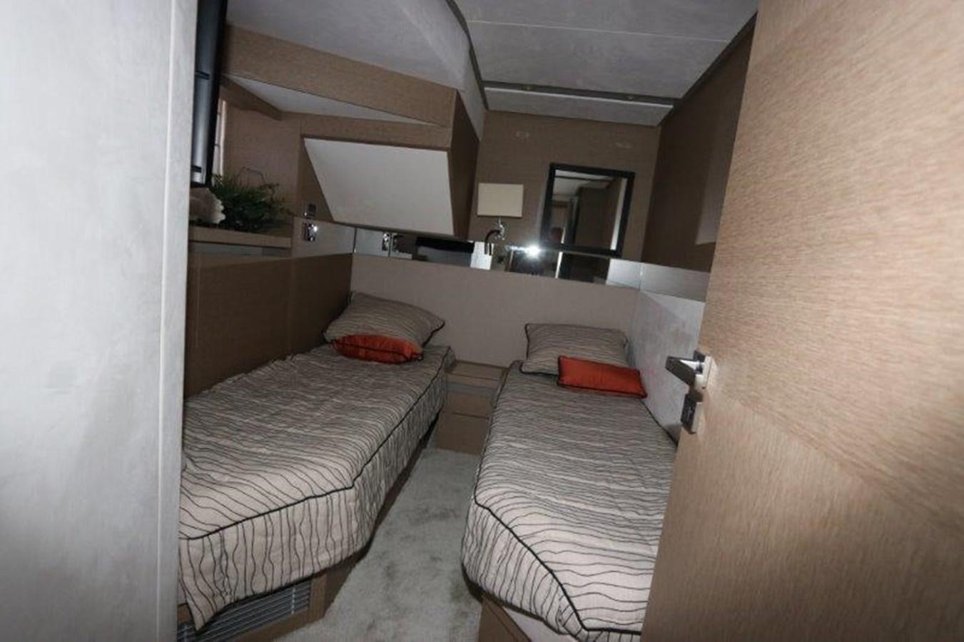 a room with two beds aboard BREATHE EASY Yacht for Sale