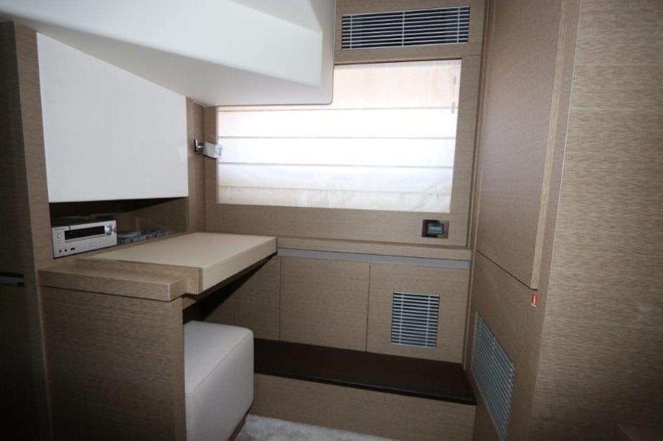 a room with a window and a desk aboard BREATHE EASY Yacht for Sale